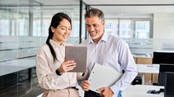 Two,Happy,Professional,Business,People,Team,Asian,Woman,And,Latin