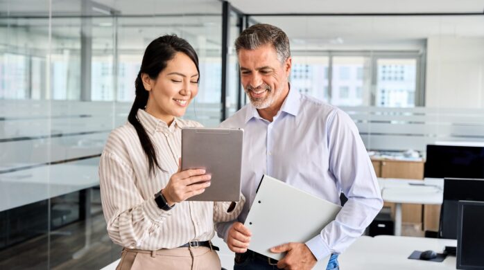 Two,Happy,Professional,Business,People,Team,Asian,Woman,And,Latin